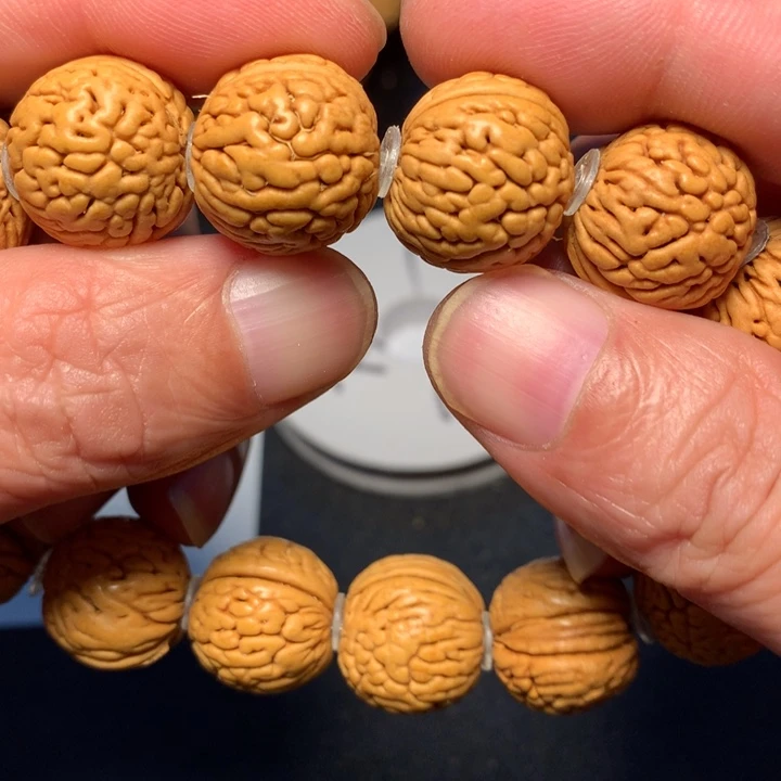 桃核手串6号健健康康了