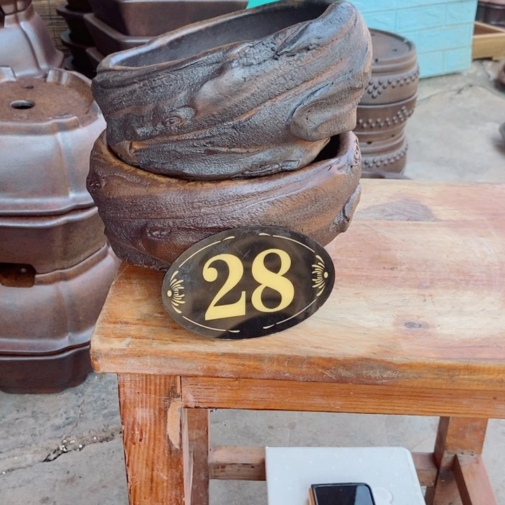 一**在杨冬益紫砂花盆