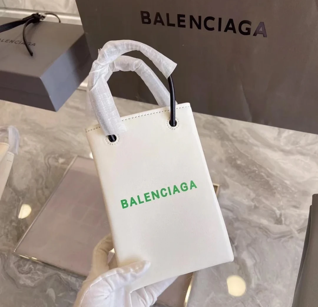 95新 Balenciaga/巴黎世家 巴黎世家白色琴谱斜挎包 22100