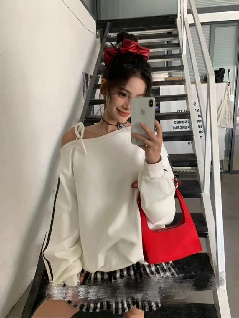 早秋新款时尚百搭时尚宽松斜襟上衣松紧腰格子短裙套装