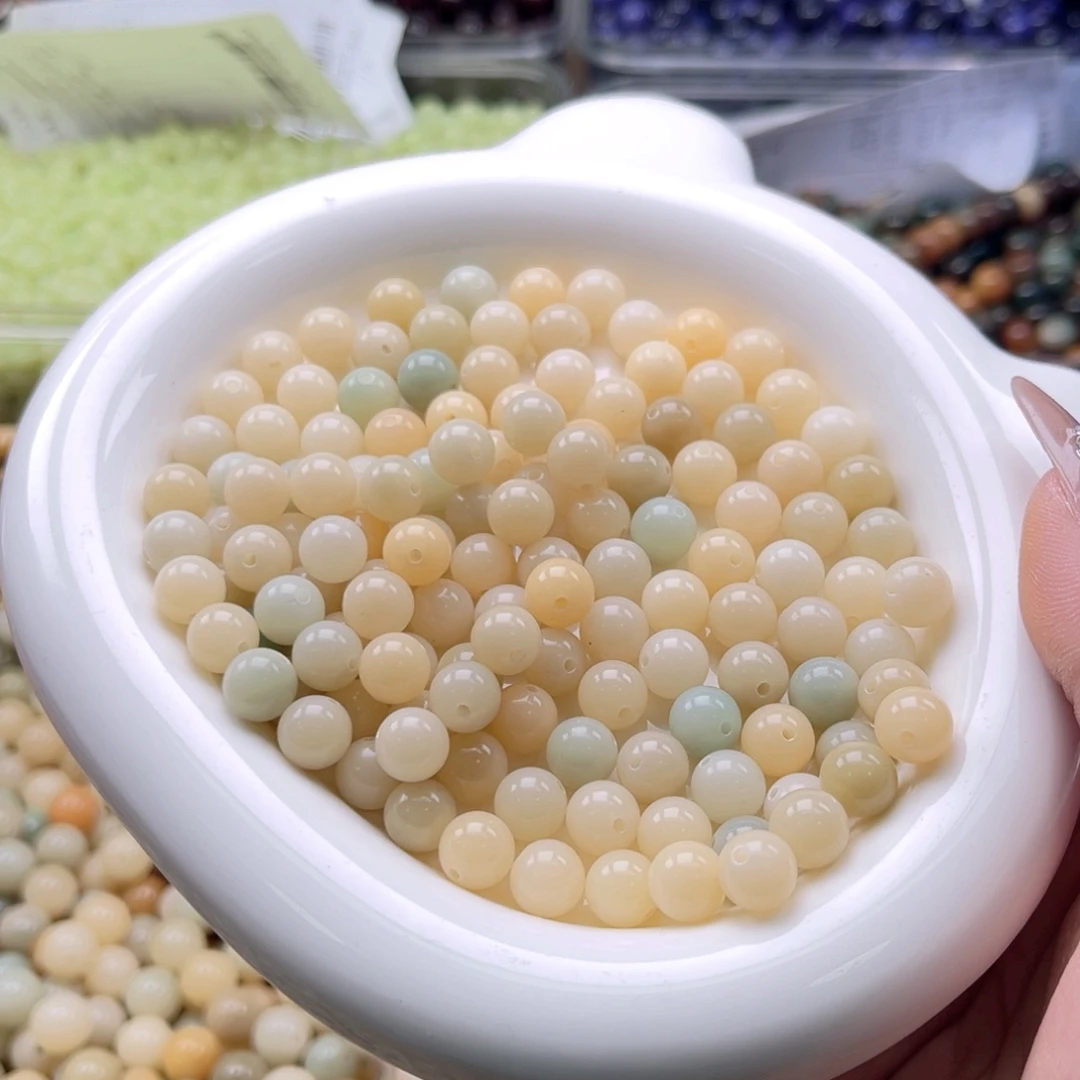 白玉菩提吊坠z8.5mm150颗。迷你珠