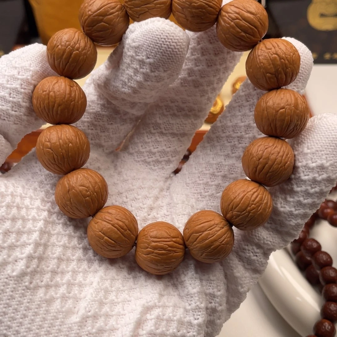 吊坠猴头核桃凤羽