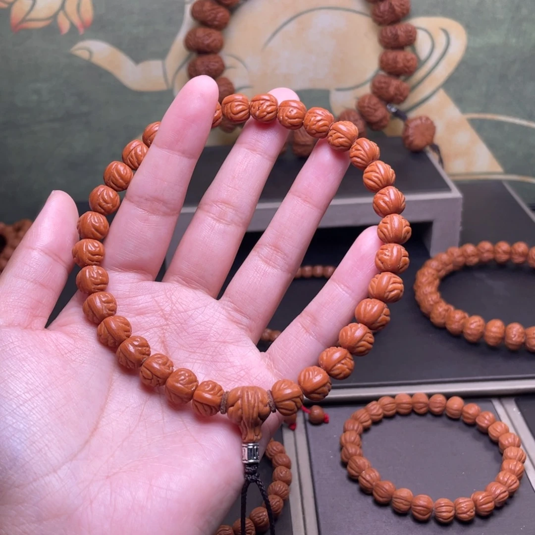 以***马桃核吊坠10金蟾纹手持