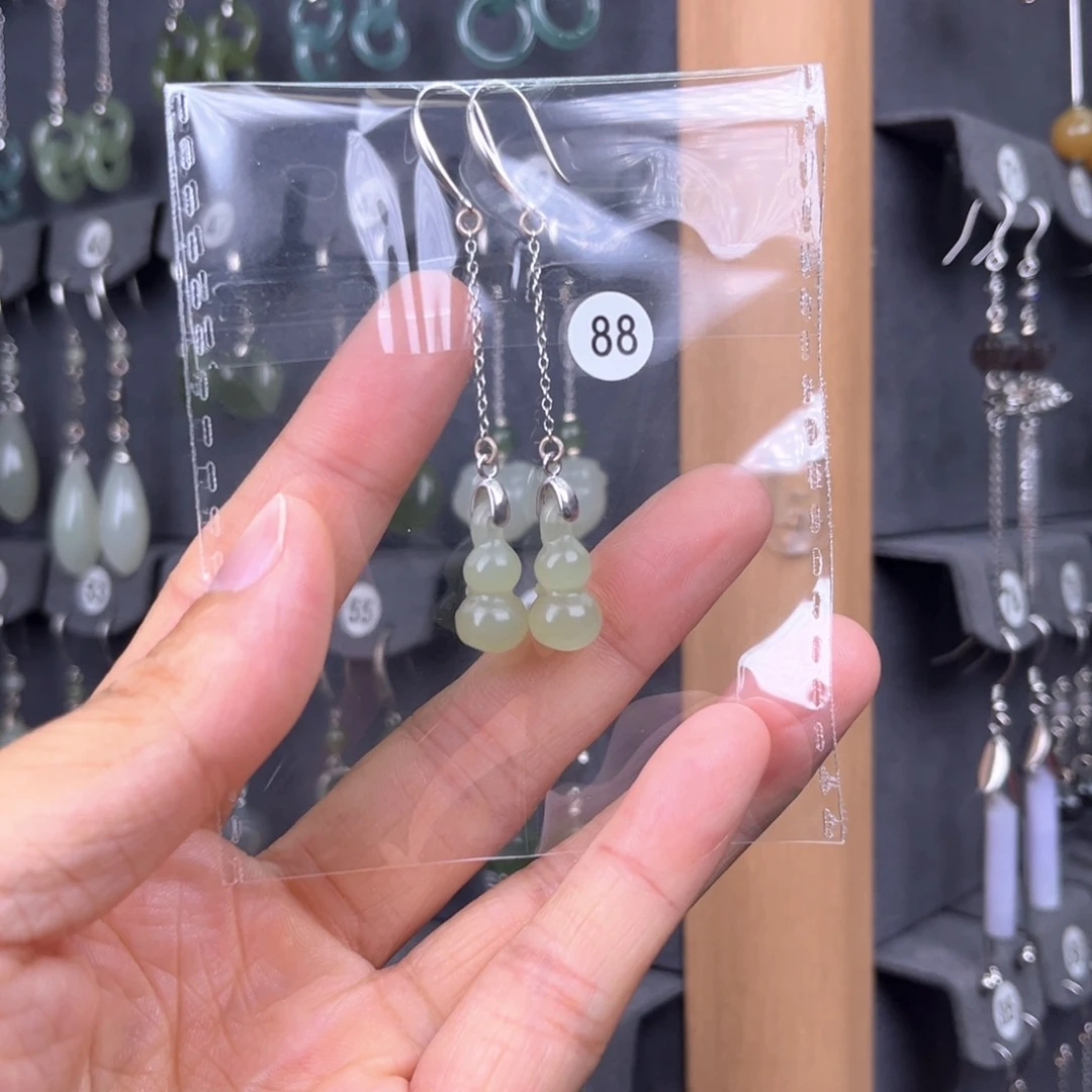 和田玉银S925镶嵌耳饰淡**笑