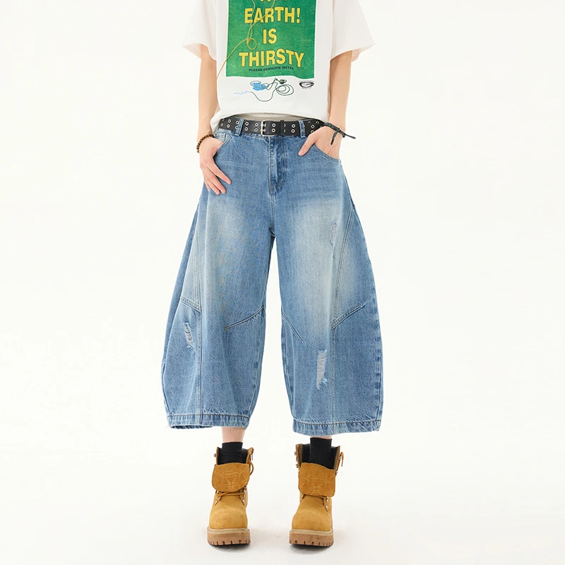 春夏时尚轻奢弯刀破洞阔腿七分牛仔短裤网红水洗蓝7分中裤潮男款