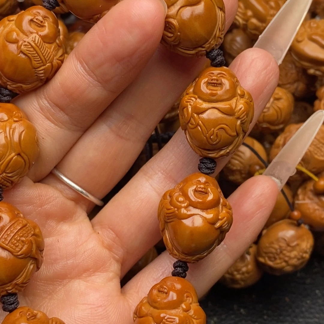 橄榄核手串开心米勒