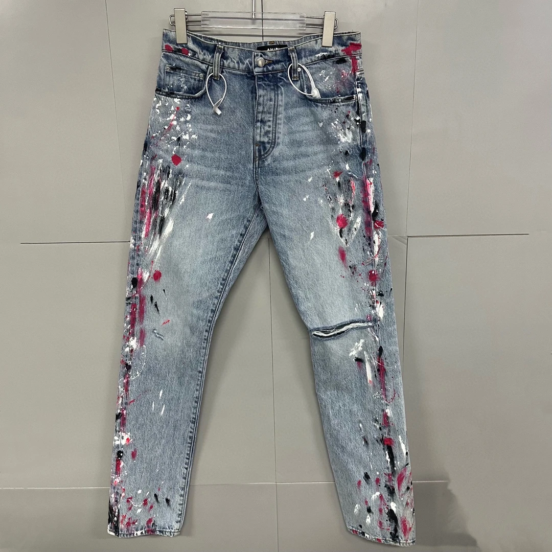 99新 AMIRI 破坏泼墨牛仔长裤 30码 D18545