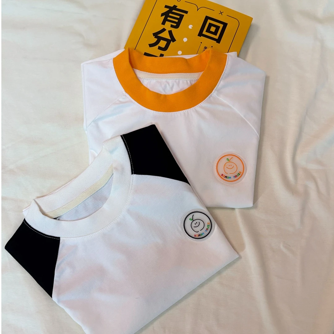 2025年夏季新款圆领拼接皮标T恤百搭