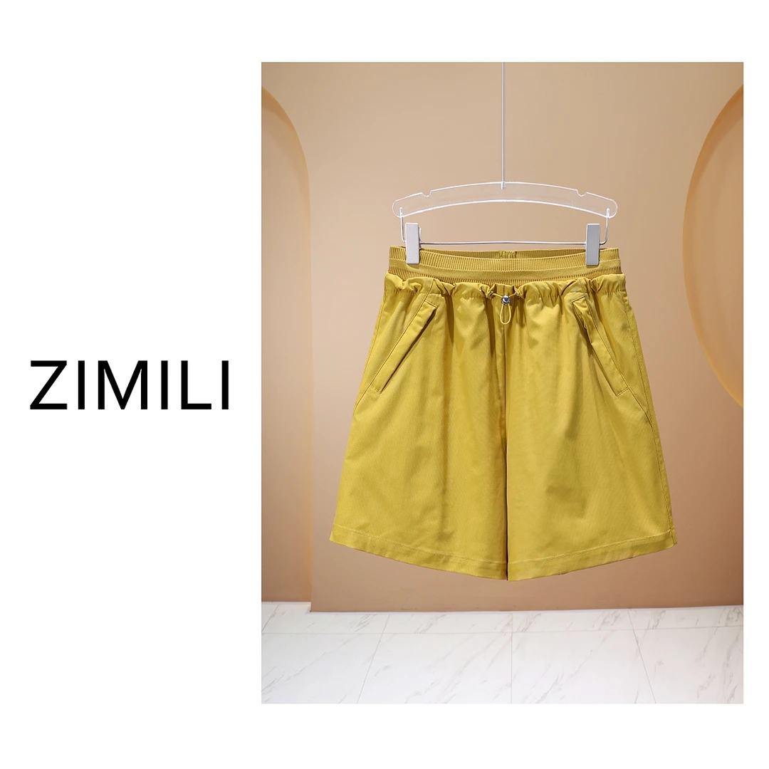 【亮哥女装】欧版姜黄色轻薄舒适松紧腰休闲伞形短裤 7928