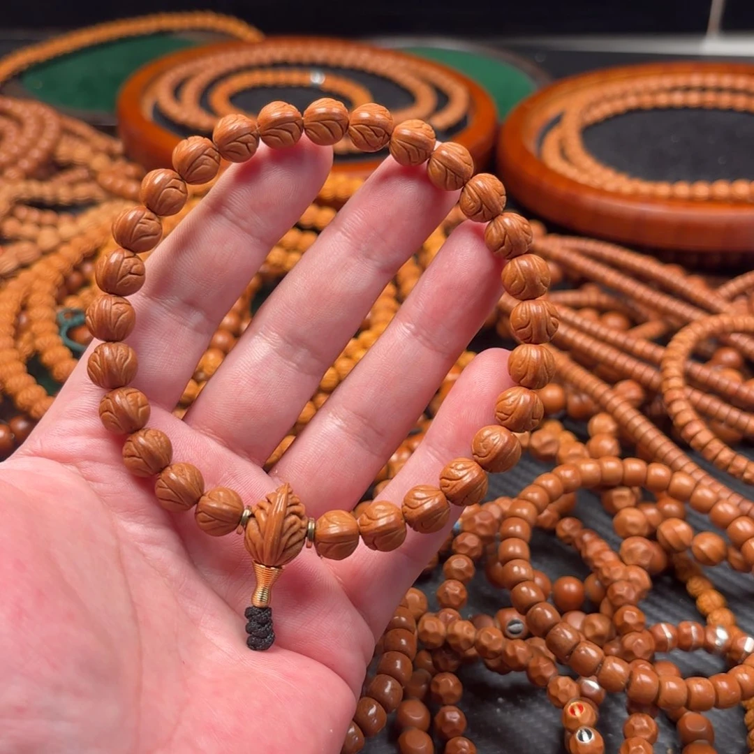 唐***首桃核吊坠一物一图