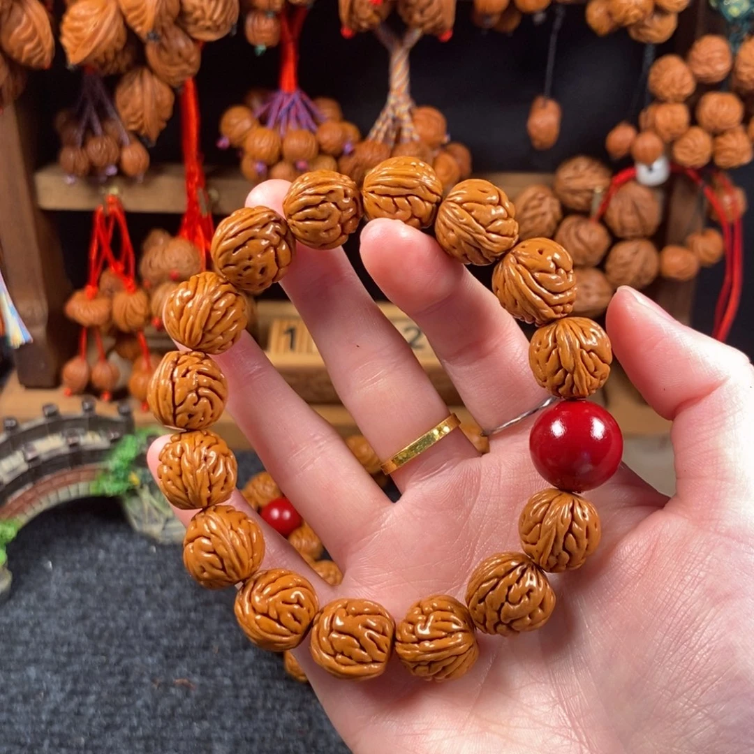 吊坠桃核桃枭手串