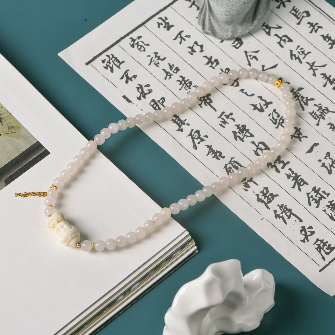 和田玉藕粉搭配猛犸精雕观姐姐双圈手串