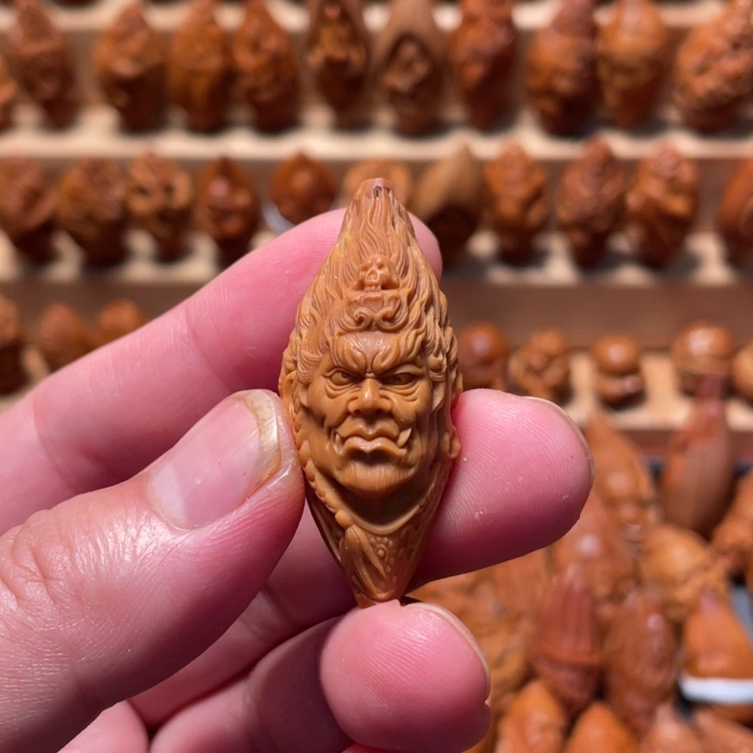 橄榄核吊坠命**在不懂明王