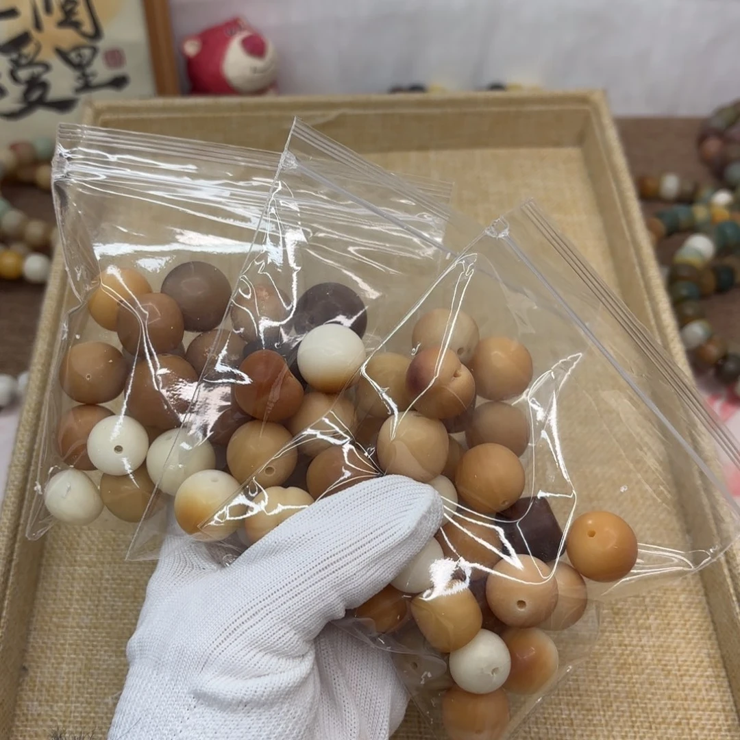 菩提根/象牙果吊坠干磨大瑕疵落地果混装散珠20颗一锅随单357