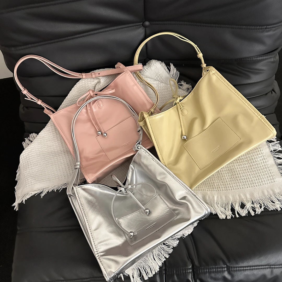 2025早春新款大容量托特包可单肩斜挎背高级感多巴胺色系女包