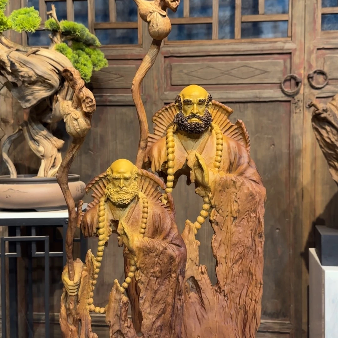 彭***里香樟木达摩祖师桌面