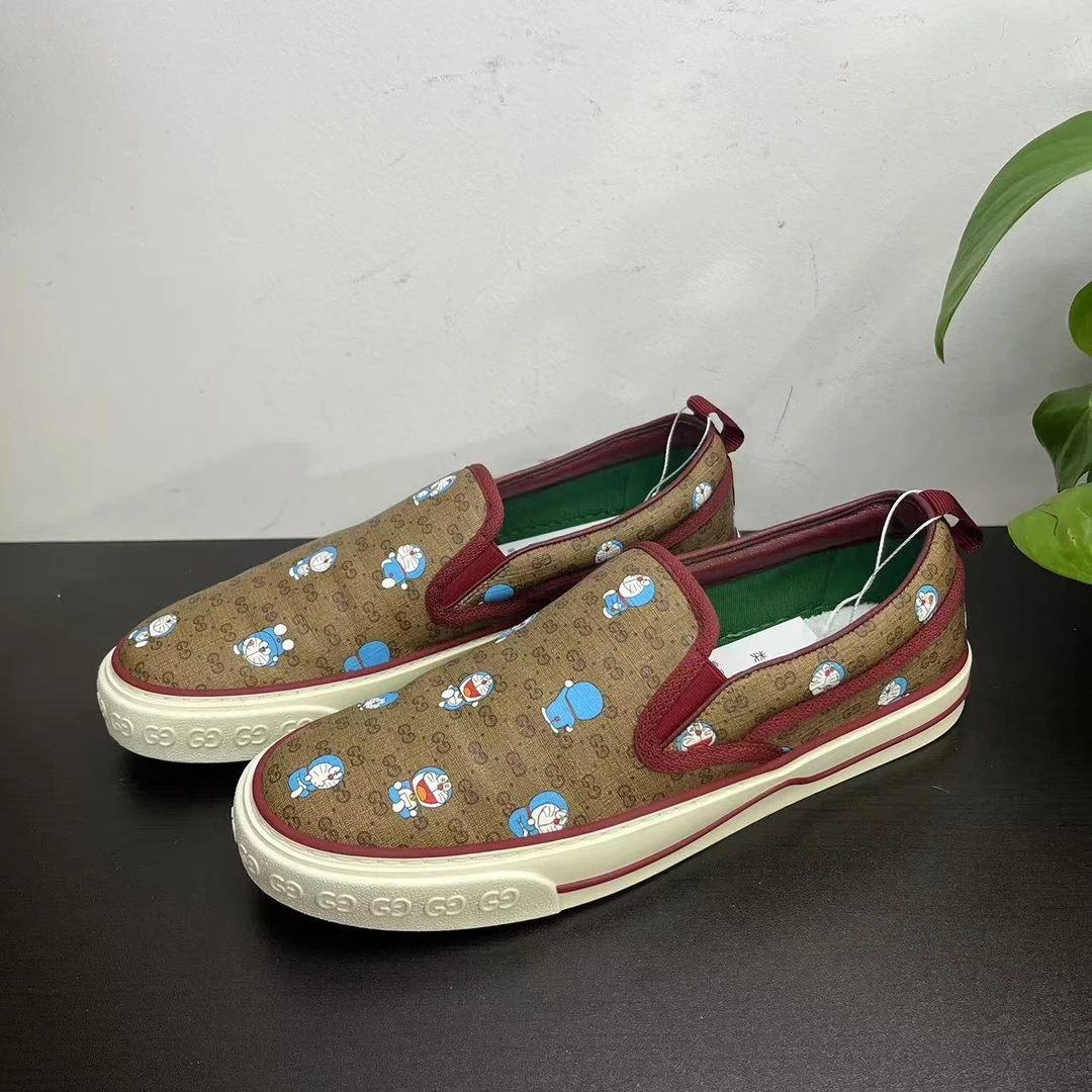 99新 GUCCI/古驰 42欧码叮当猫1977棕老花一脚蹬板鞋百搭时尚