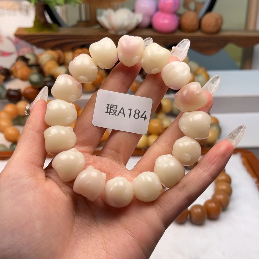 菩提根/象牙果吊坠14mm瑕兔子一串a184