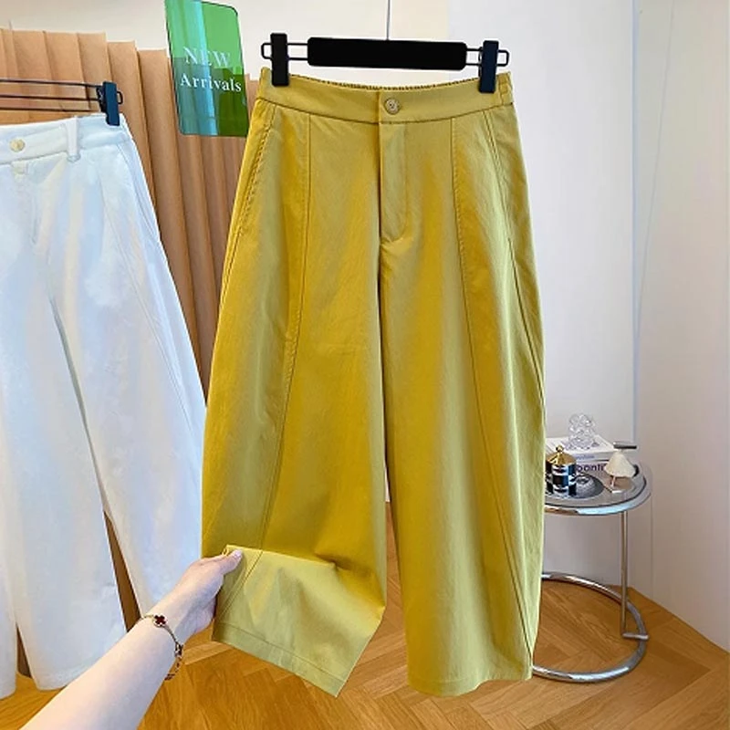 高级感黄色宽松休闲八分裤女2025夏季新款薄款弯刀裤镰刀裤九分裤