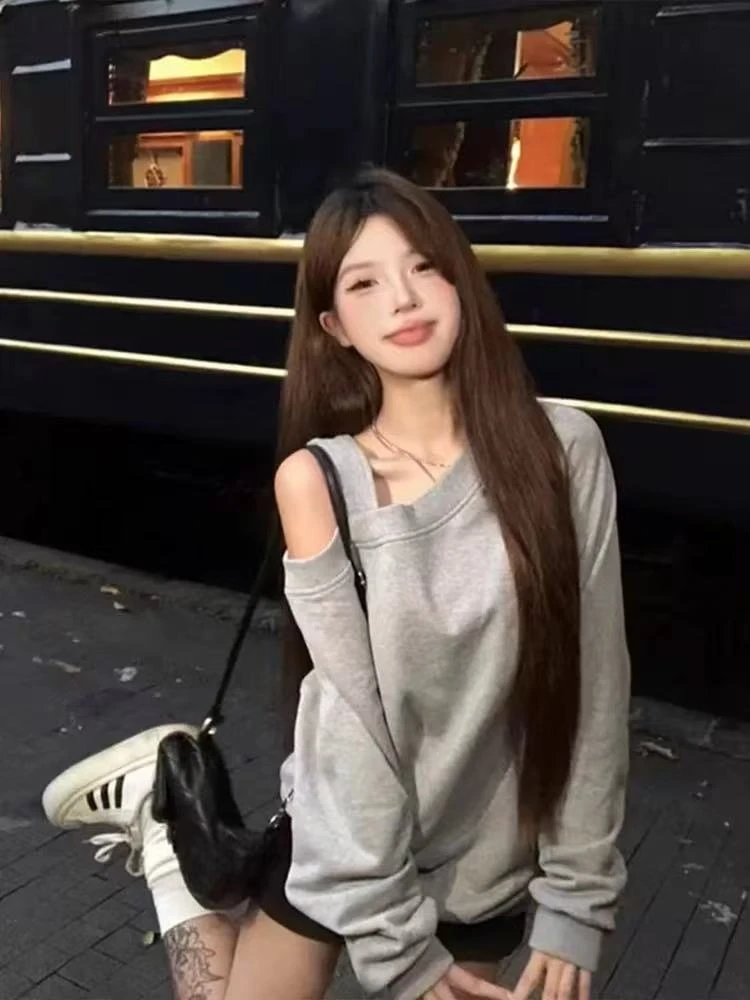 韩系高级感斜领露肩卫衣女春秋装宽松韩版薄款设计感插肩长袖上衣