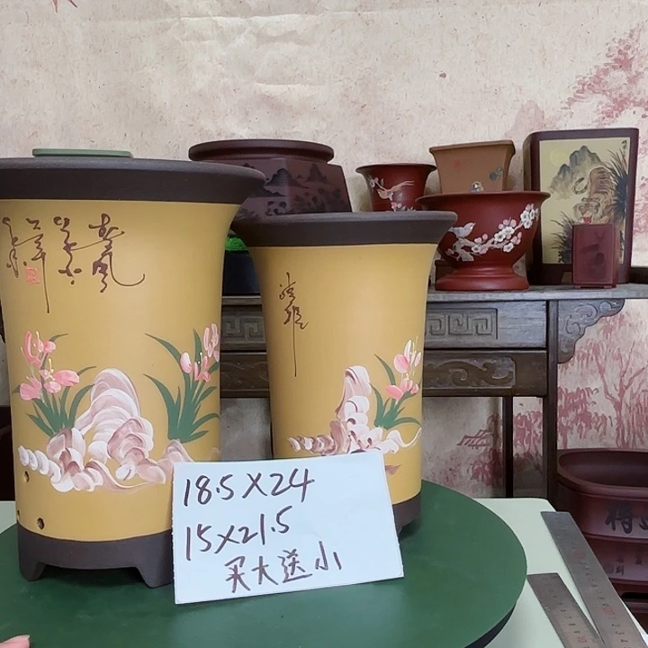 紫砂花盆彩绘兰花