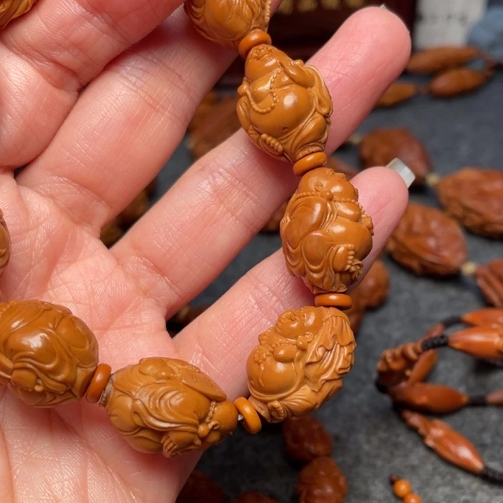 橄榄核吊坠弗**杨橄榄核