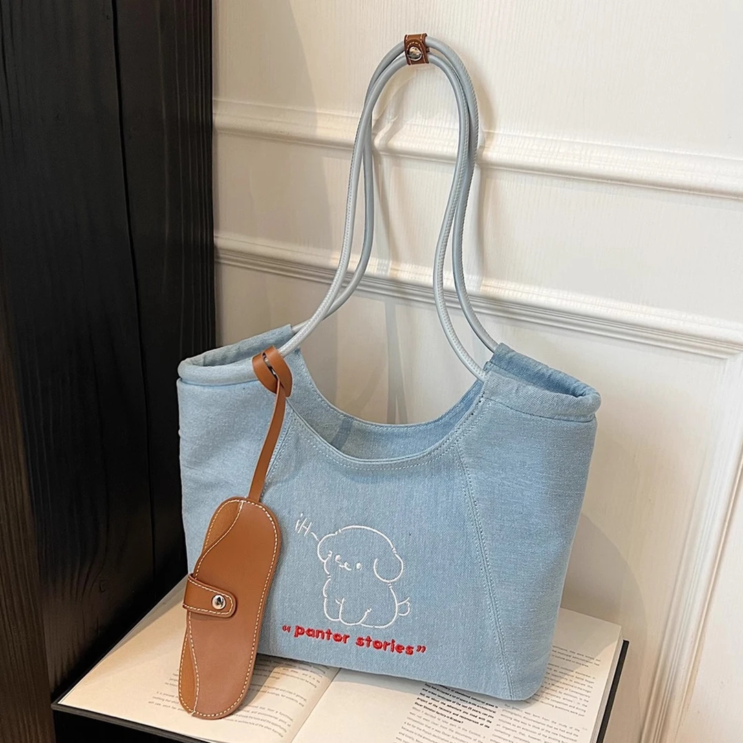 牛仔布包包女大容量2025新款春夏季休闲百搭单肩大学生上课托特包