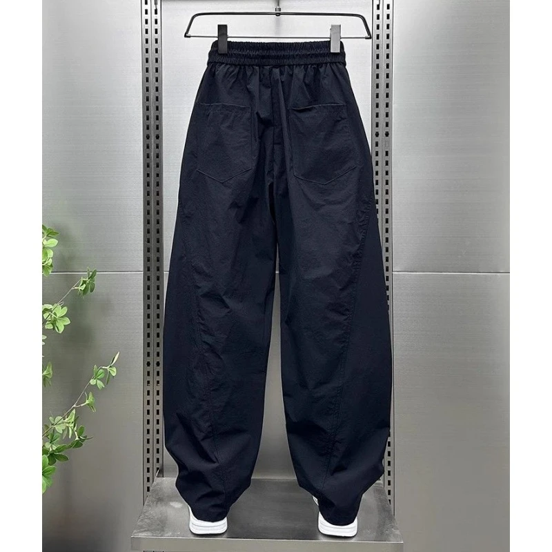 新款2025纯色简约设计感休闲裤透气高级感运动弯刀直筒男士阔腿裤