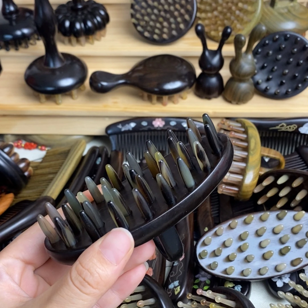 瑕疵紫光檀按摩梳子