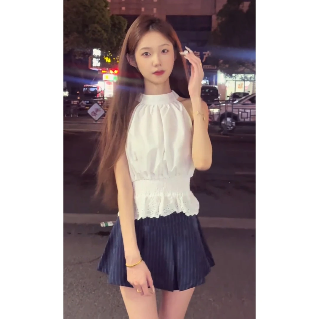 温柔纯欲风挂脖吊带背心收腰上衣搭配条纹百褶短裙高级感气质套装