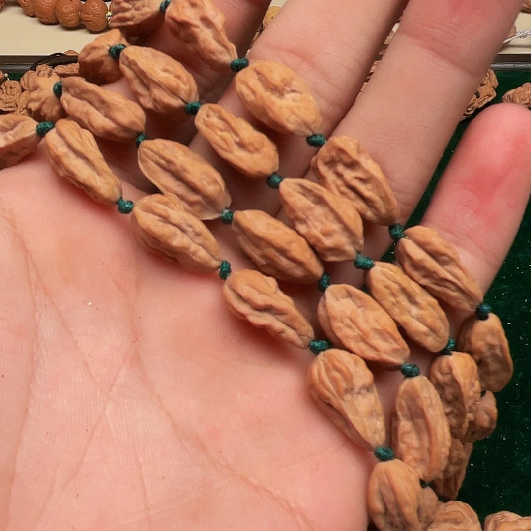 垣***贸文玩核桃吊坠异性