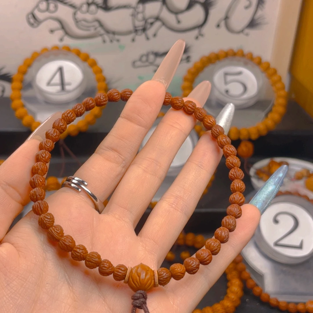 顺***子桃核吊坠0.6666666666666