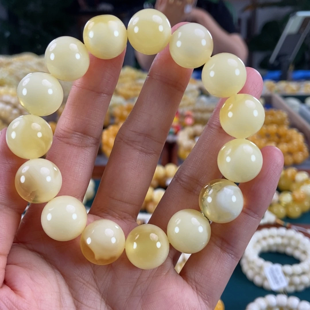 琥珀未镶嵌珠宝奇石15同料金白荧光圆珠30.68