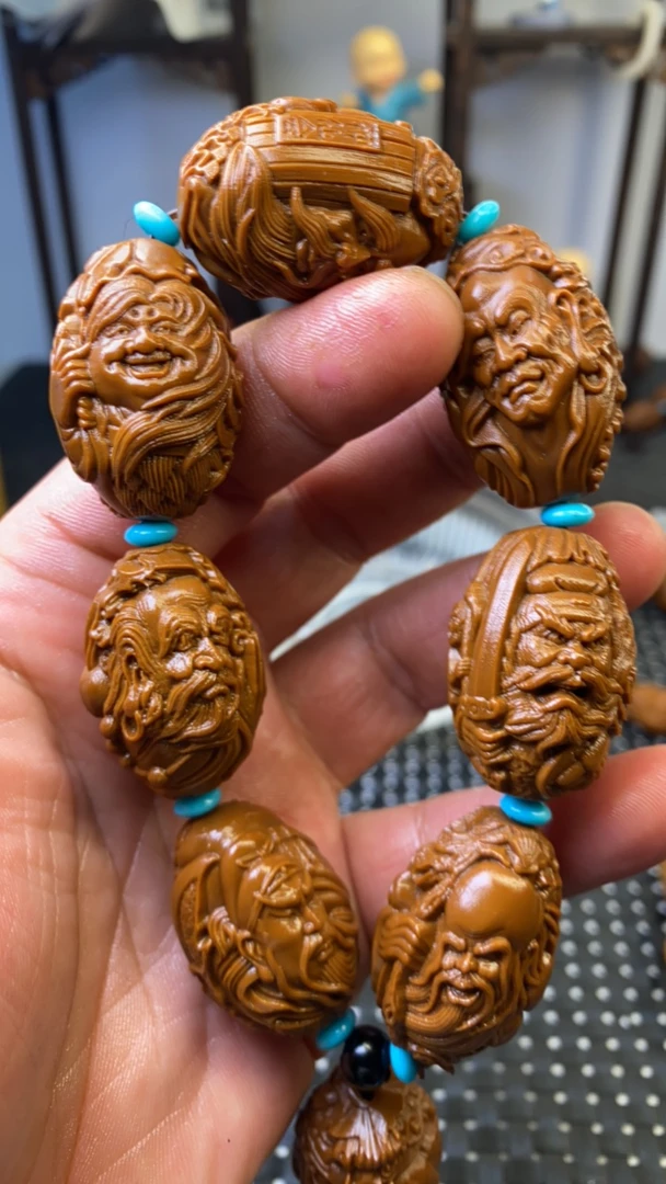 2.28瑞兽神仙会雕刻手串是黄金树黄金核不是橄榄核是黄金核手串