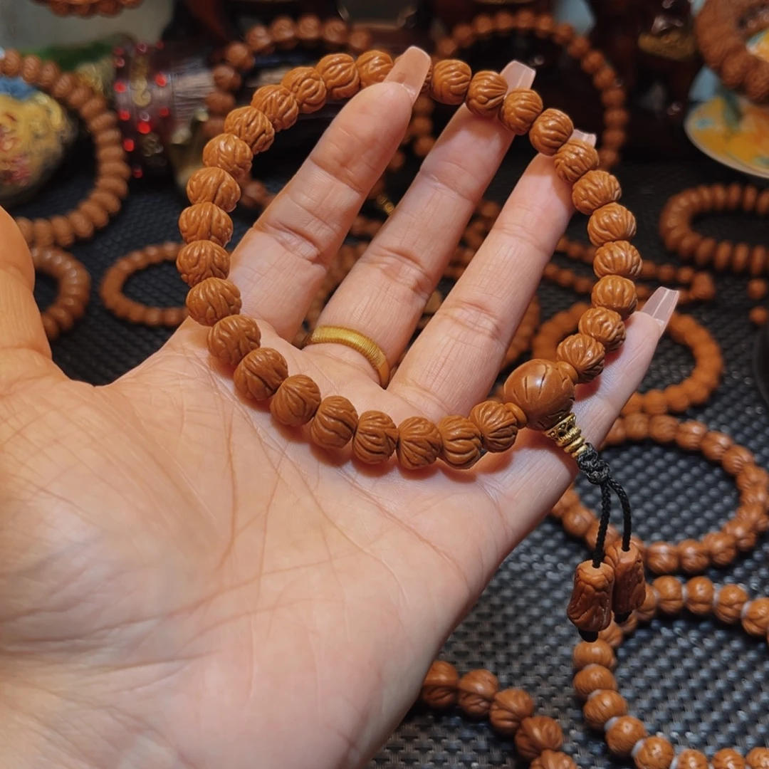 闹***y手串桃核11野生小飞龙手持