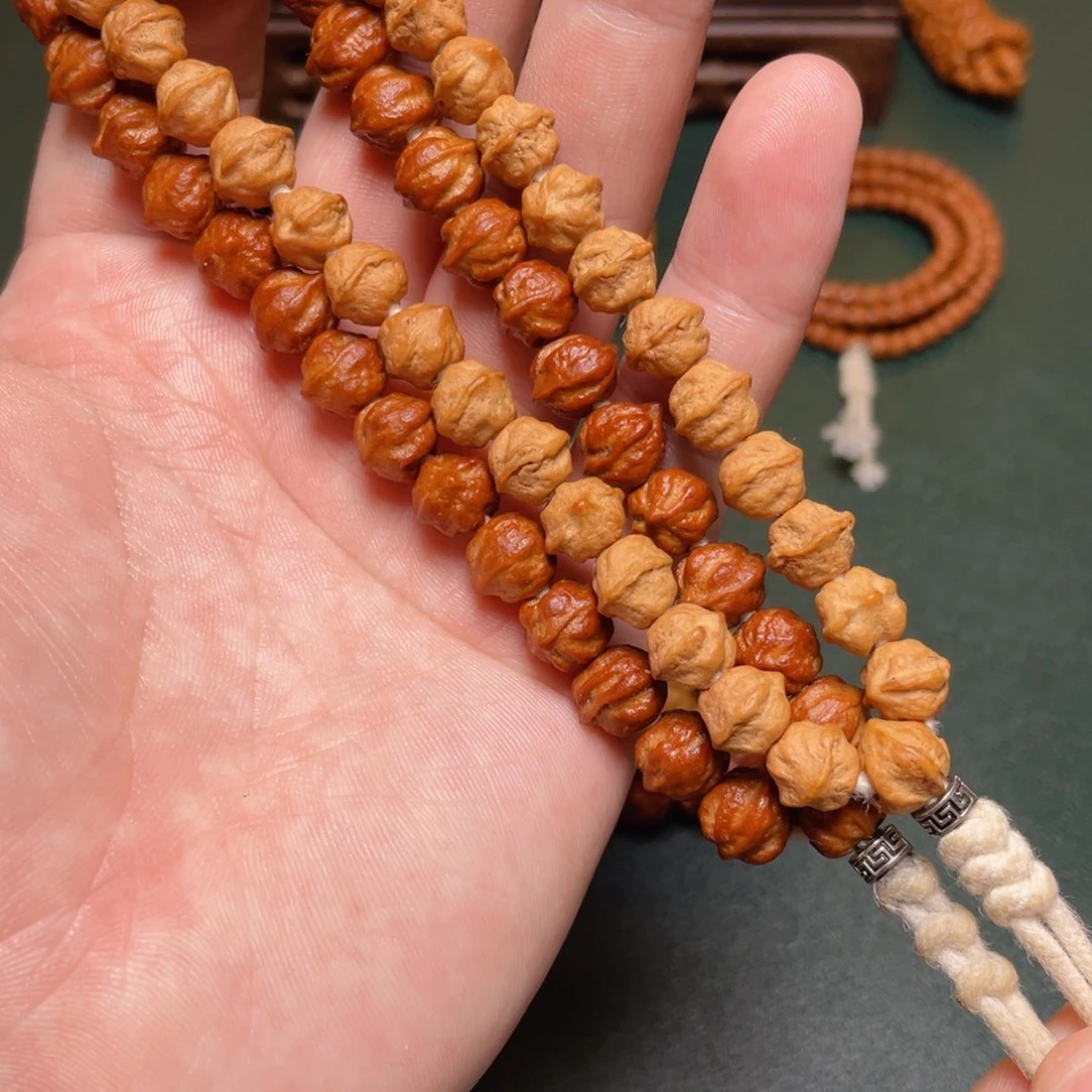 柏香籽/百香籽吊坠白牙横打手持