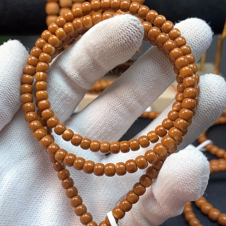 橄榄核手串4.8老挝核尖极限弧108漏白