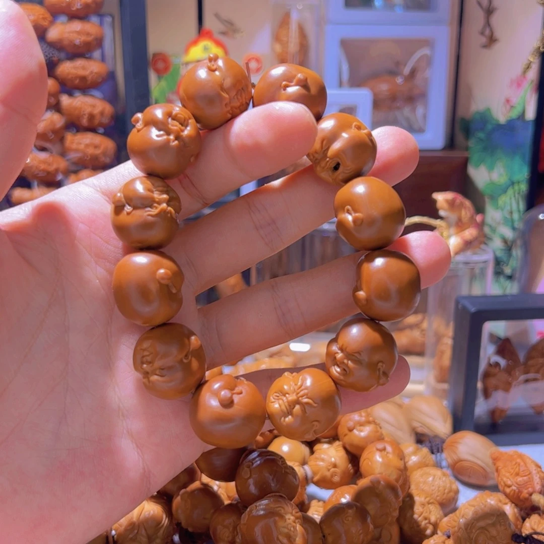 北***影橄榄核雕手工百态金果王