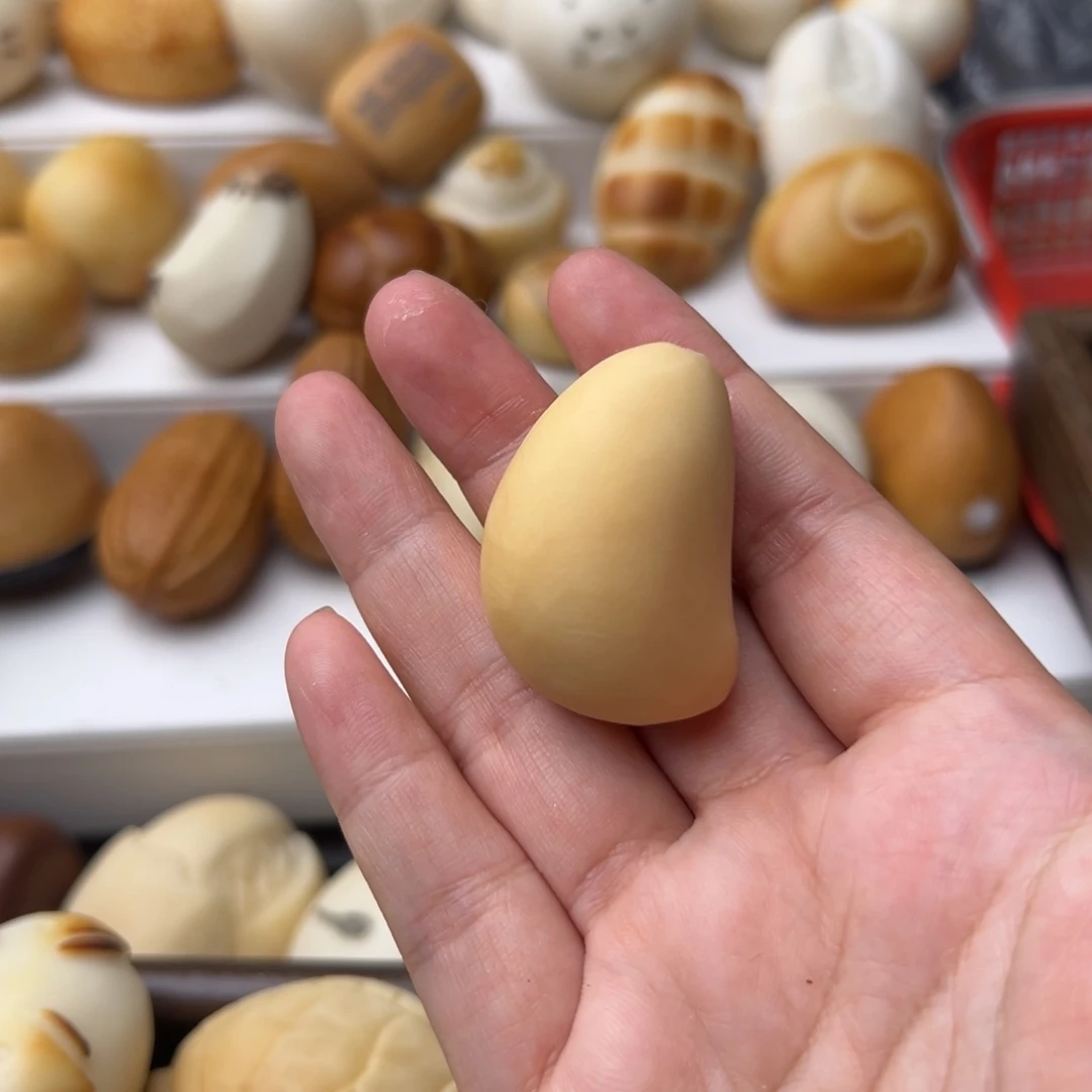 玉***帝菩提根/象牙果把件定制蒜瓣打孔编绳补邮费