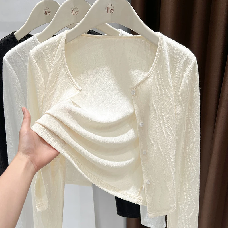 薄款圆领修身海边防晒披肩春季新款设计感波浪花纹短开衫高级外套