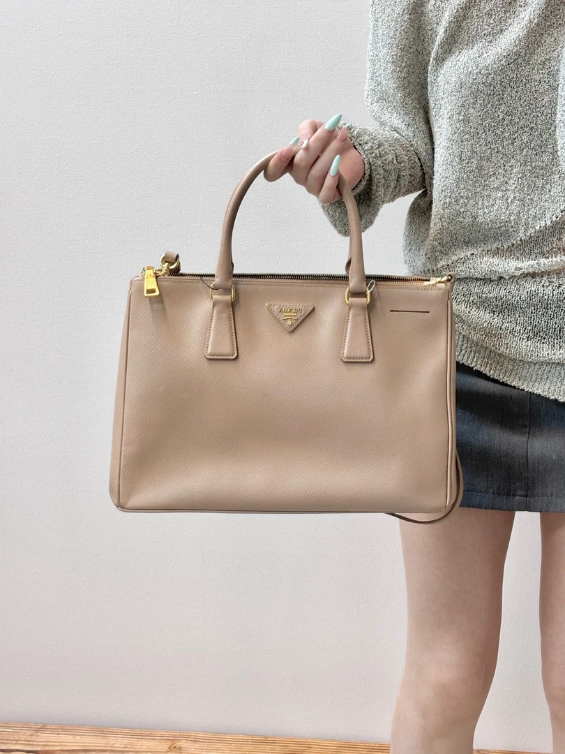 95新 Prada/普拉达 prada 裸粉色杀手手提单肩包(K)