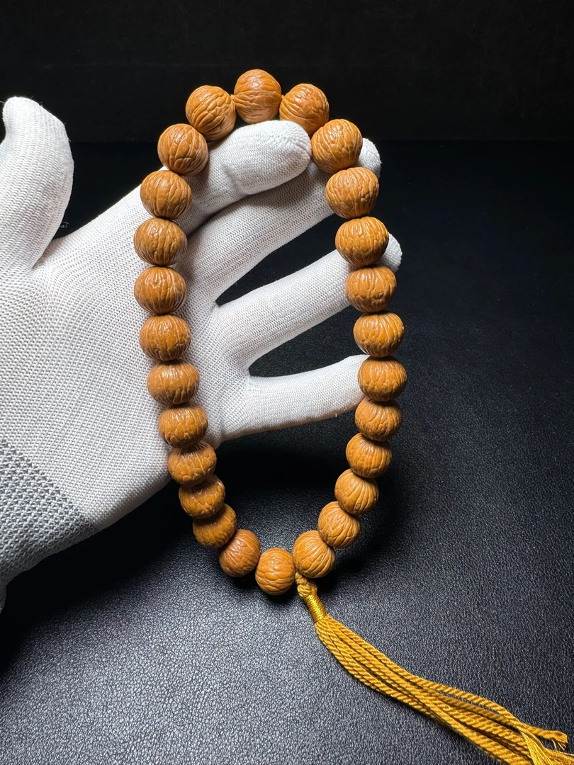 精品猴头核桃凤羽手持（26颗籽）(黄线灰线 颜色随机发)