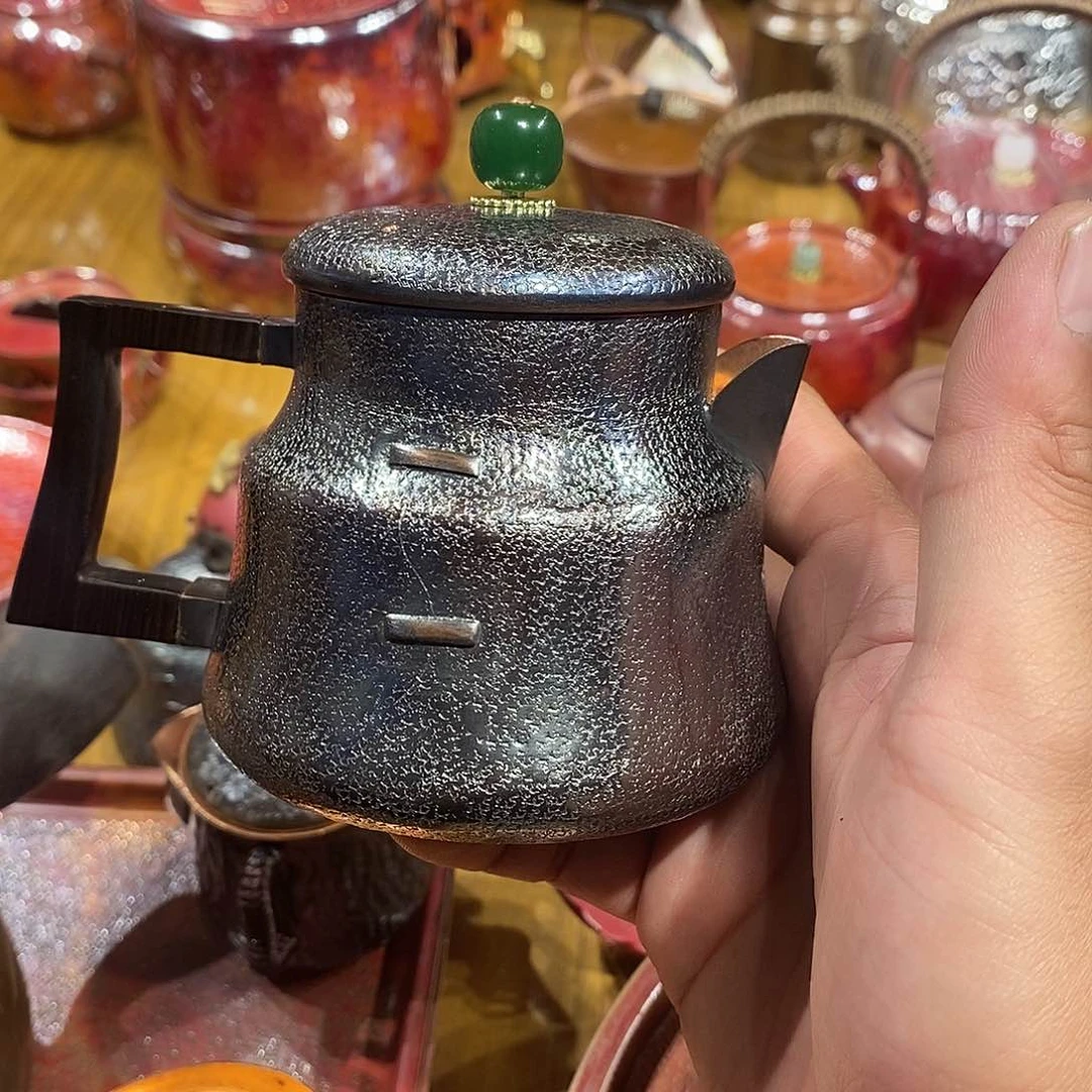 启*星复古色400菊钉泡壶手工锻打工艺