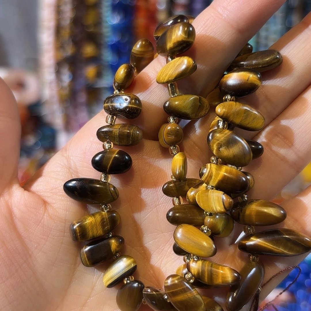 玛瑙/玉髓合金珠宝半成品虎眼长牙一条