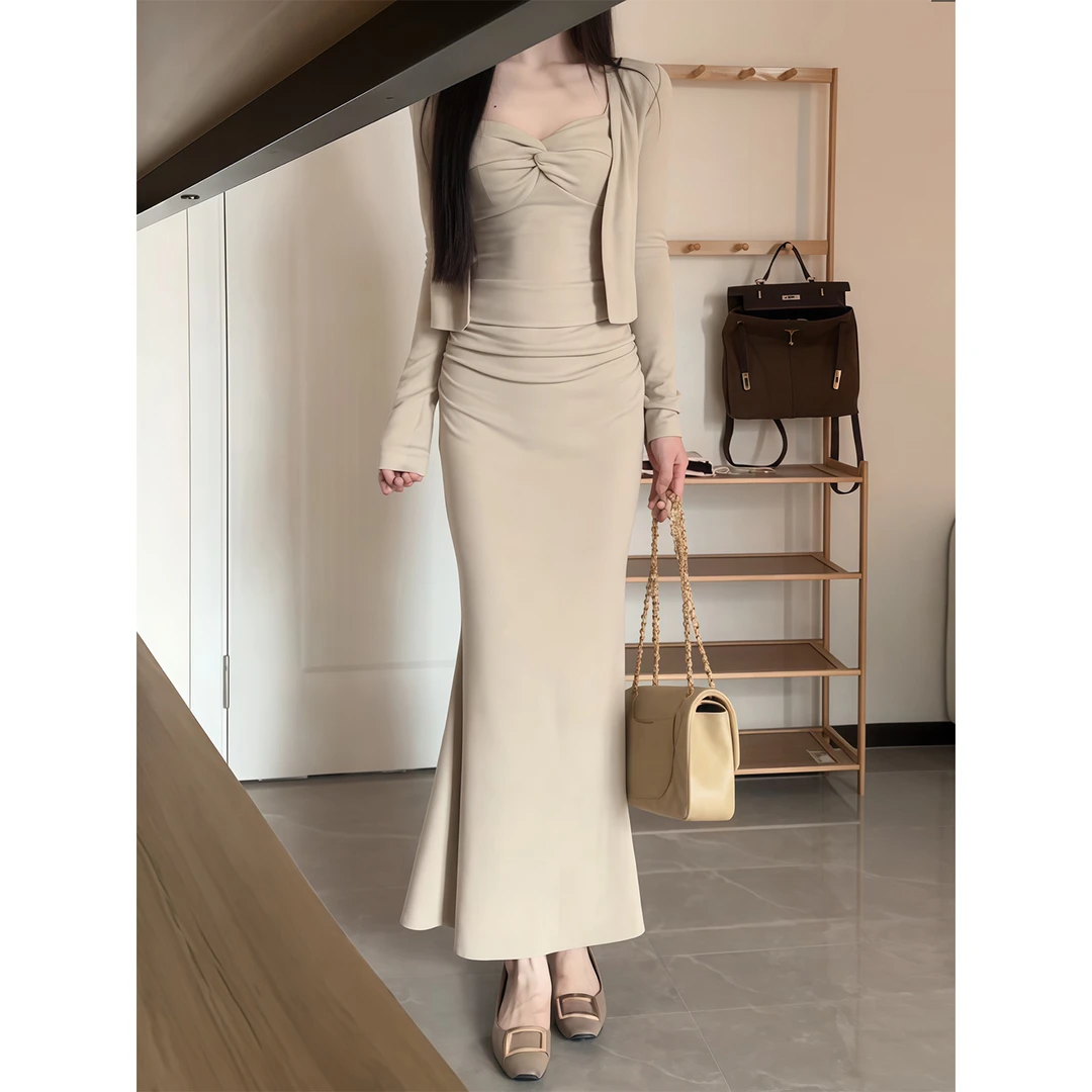 纯欲辣妹扭结V领吊带背心开衫女早秋新款修身显瘦包臀半身裙套装