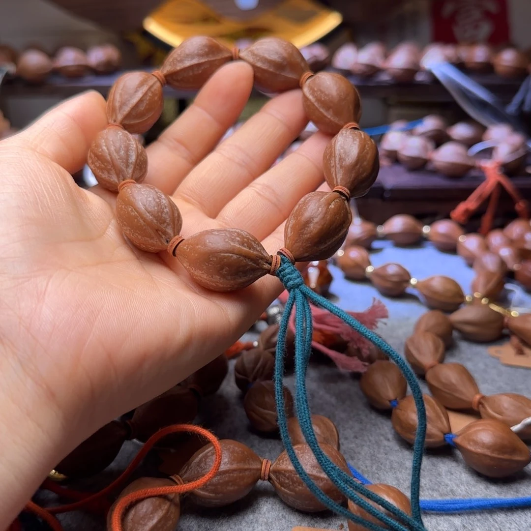 橄榄核吊坠C****）1929梅林铁核