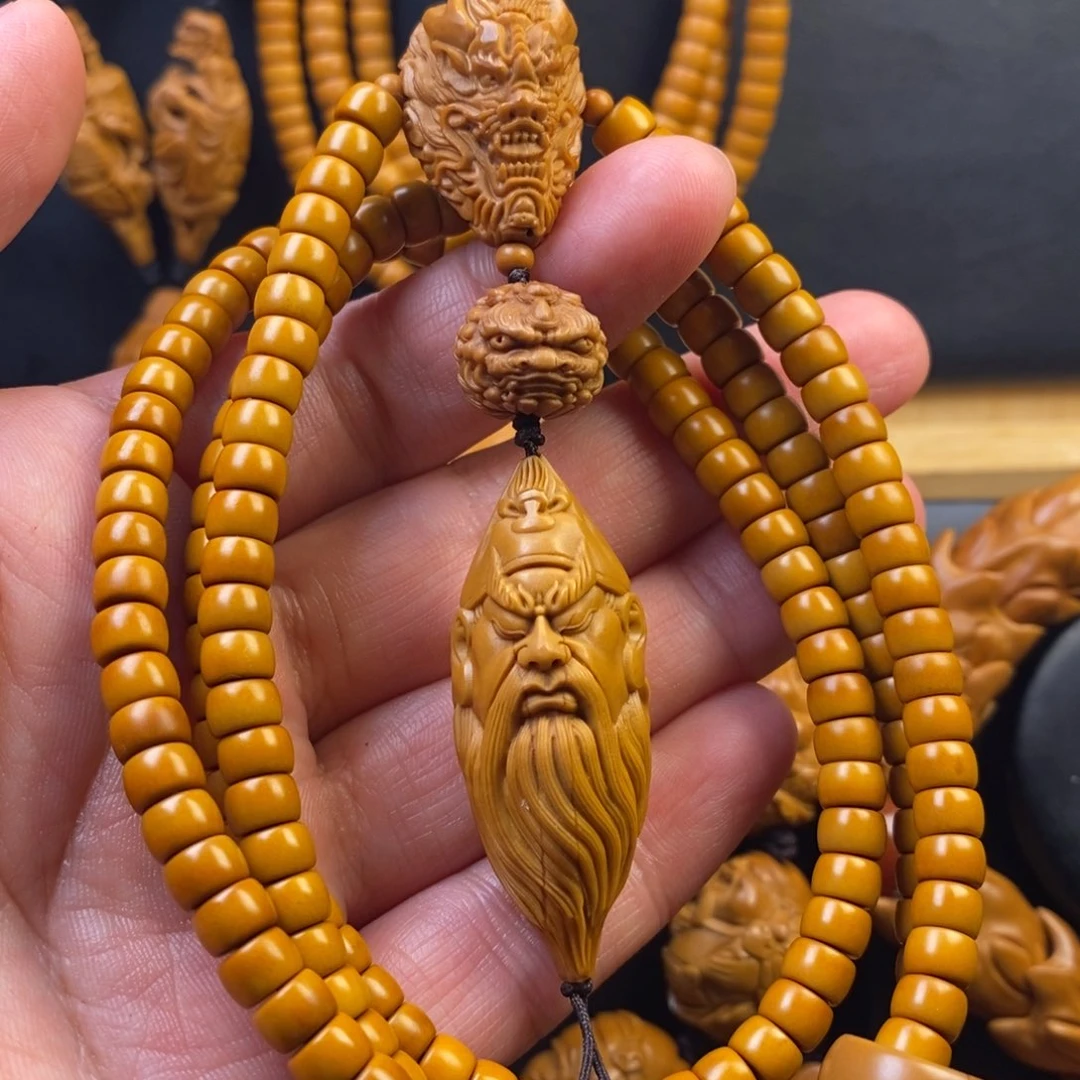 橄榄核手串关公脖挂