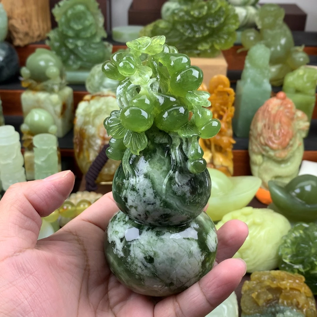 鲲****岫玉未镶嵌手把件