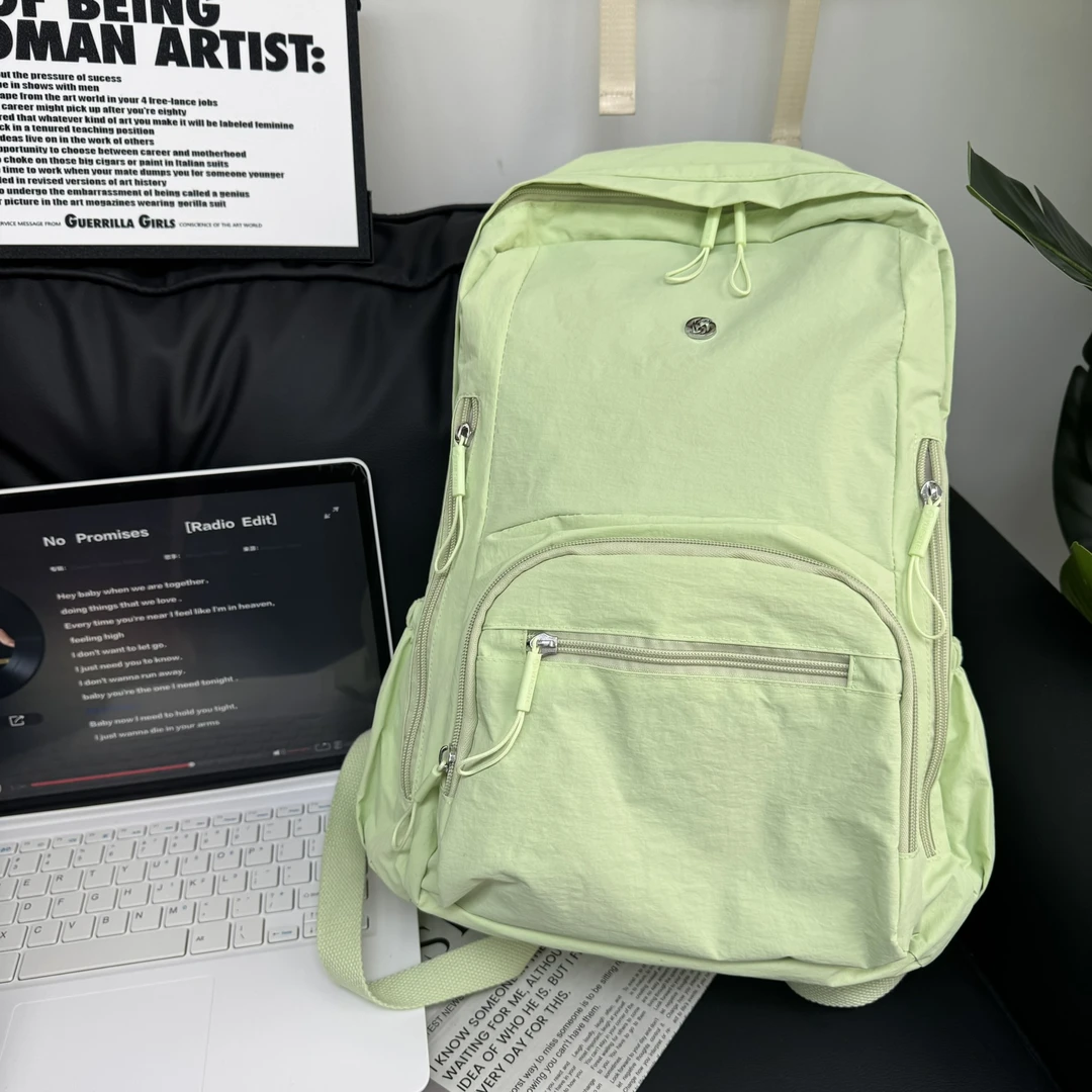 森系大容量通勤旅行背包防水轻便双肩包简约学生书包多隔层妈咪包