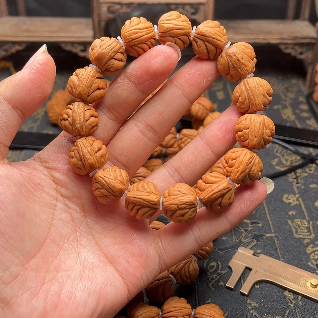 吊坠桃核包子头手串